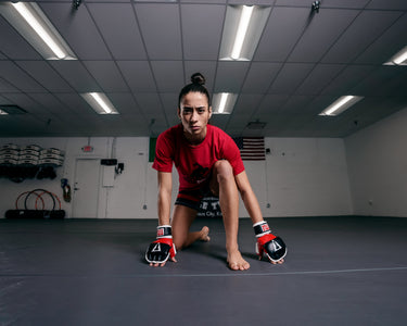 TITLE Classic Wristwrap Heavy Bag Gloves hands on the ground