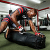 TITLE Boxing Gel Incensed Wristband Heavy Bag Gloves guy wearing gloves boxing with heavy bag