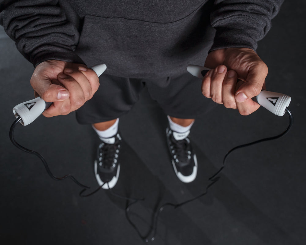 TITLE Boxing Bullet Grip Speed Rope 2.0 man holding rope